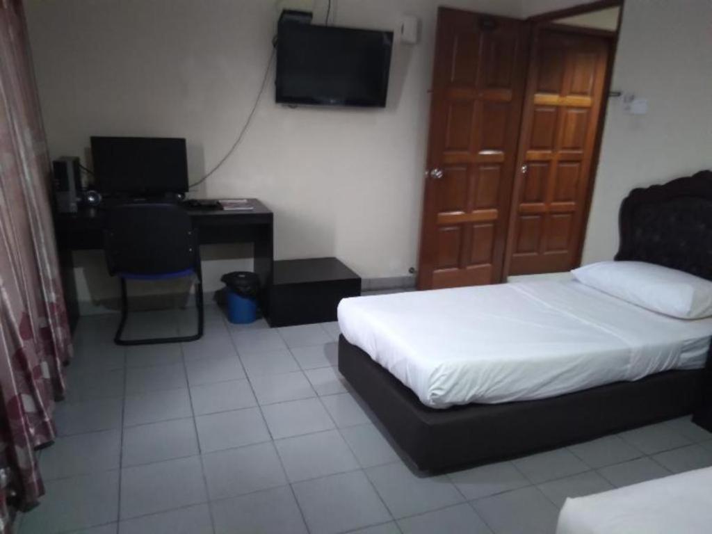 לימבאנג Oyo 90376 Centre Point Hotel מראה חיצוני תמונה